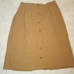 Size xl plus mustard yellow skirt with partly stretch waistband.